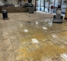 In the process of grinding glue prepping for stained concrete.